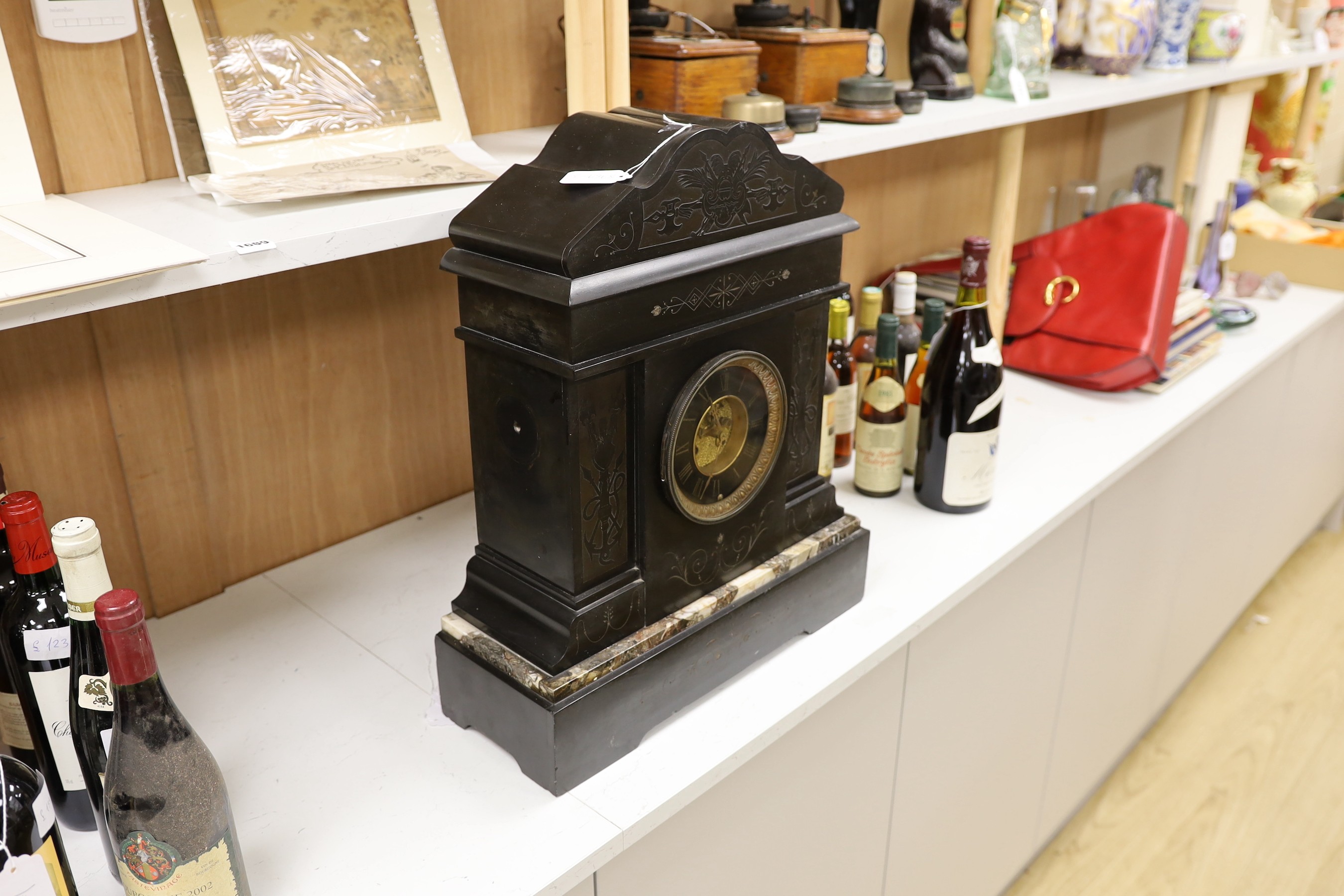 A large Victorian black slate mantel clock, 54.5cms high